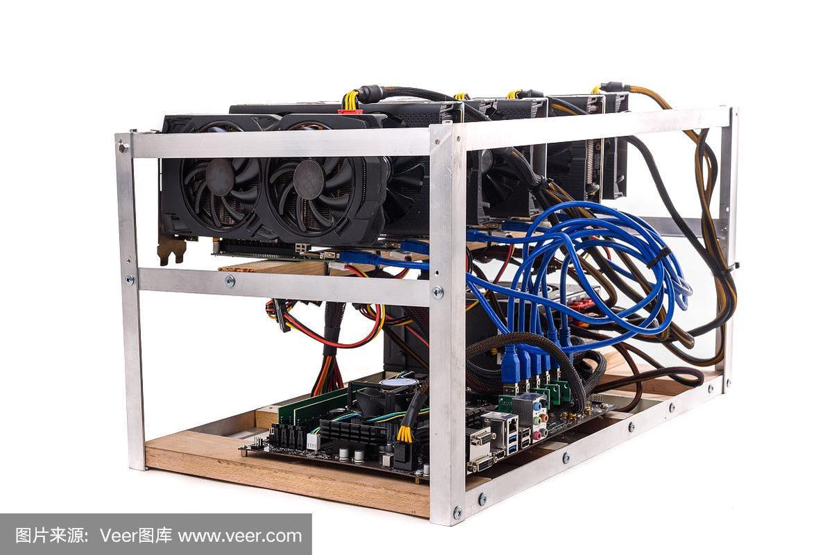A person examines the internal components of a mining rig, checking connections and cooling systems.