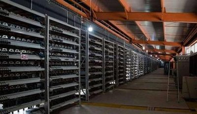 Cold climate mining farm with rows of efficient mining rigs